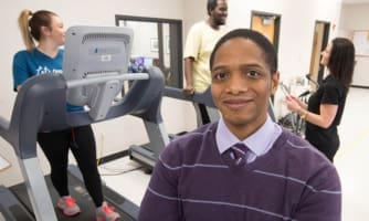 Damon Swift, Ph.D. (pictured with patients)